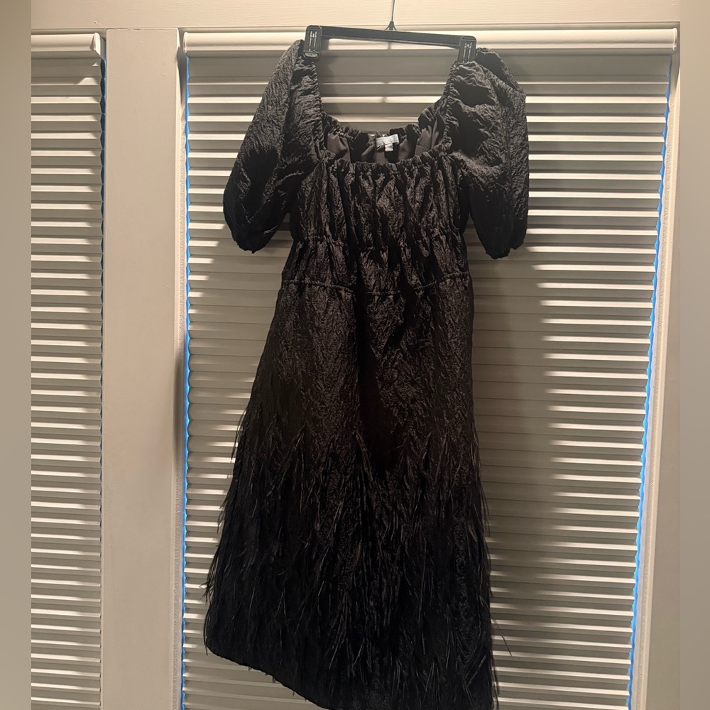 Antonio Melani black feather accent dress with square neck. Size 10.